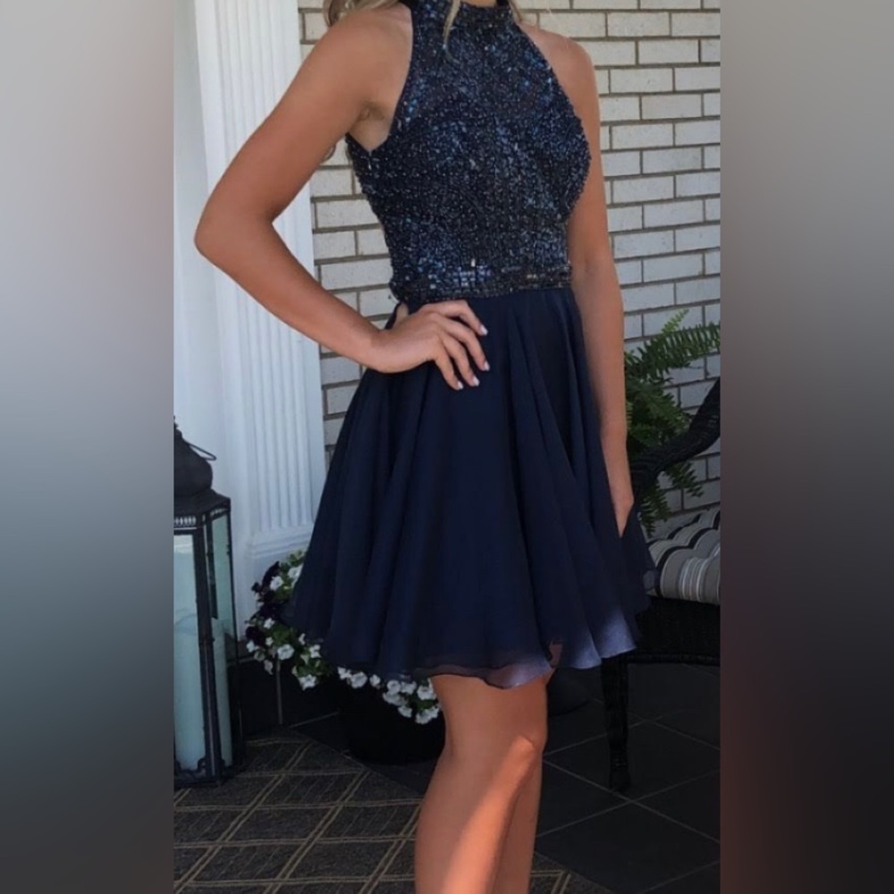 Sherrie hill navy blue dress size 12 has been altered was large in the top area